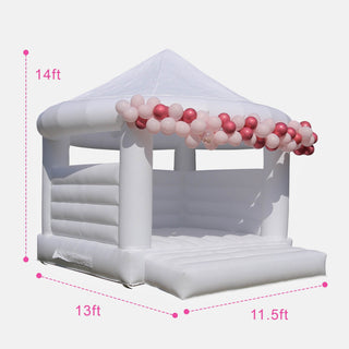 white bouncy house with roof